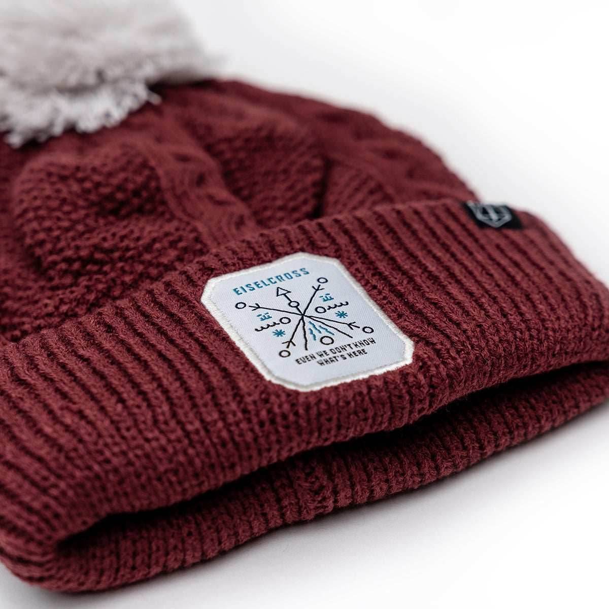 Critical Role: Eiselcross Cable Knit Beanie with Pom Pom -