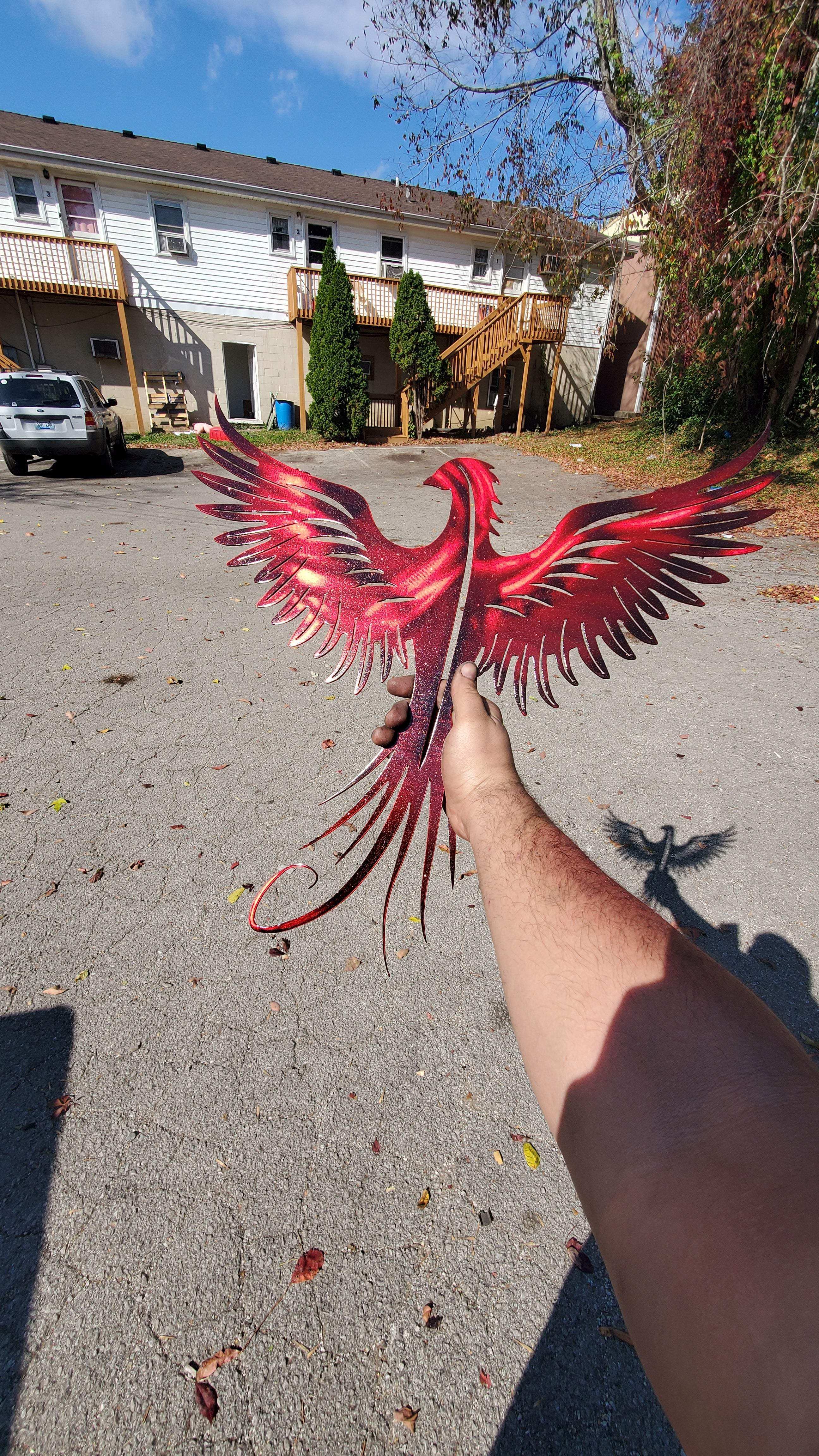 Phoenix Metal Wall Art – 23x23 Inch Plasma Cut Steel Wall Decor with Translucent Blue or Red Powder Coat – Sun Catching Home Accent