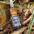 'Ancient Beetle' Individual Handmade Black Glittery Mini Liquid Potion Bottle Necklaces