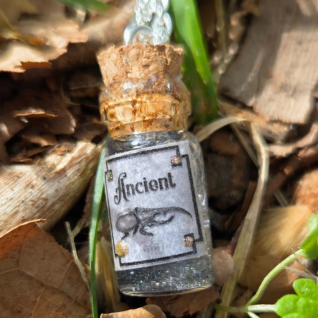 'Ancient Beetle' Individual Handmade Black Glittery Mini Liquid Potion Bottle Necklaces