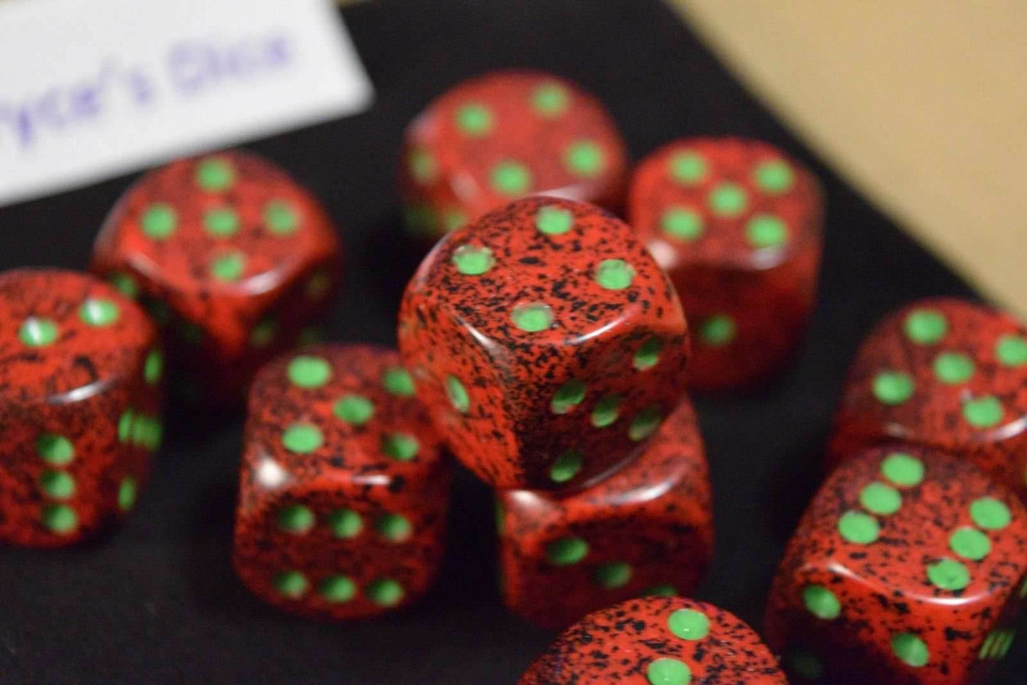 Strawberry Speckled 16mm D6 Pipped | Red/Black/Green (sold per piece) - 
