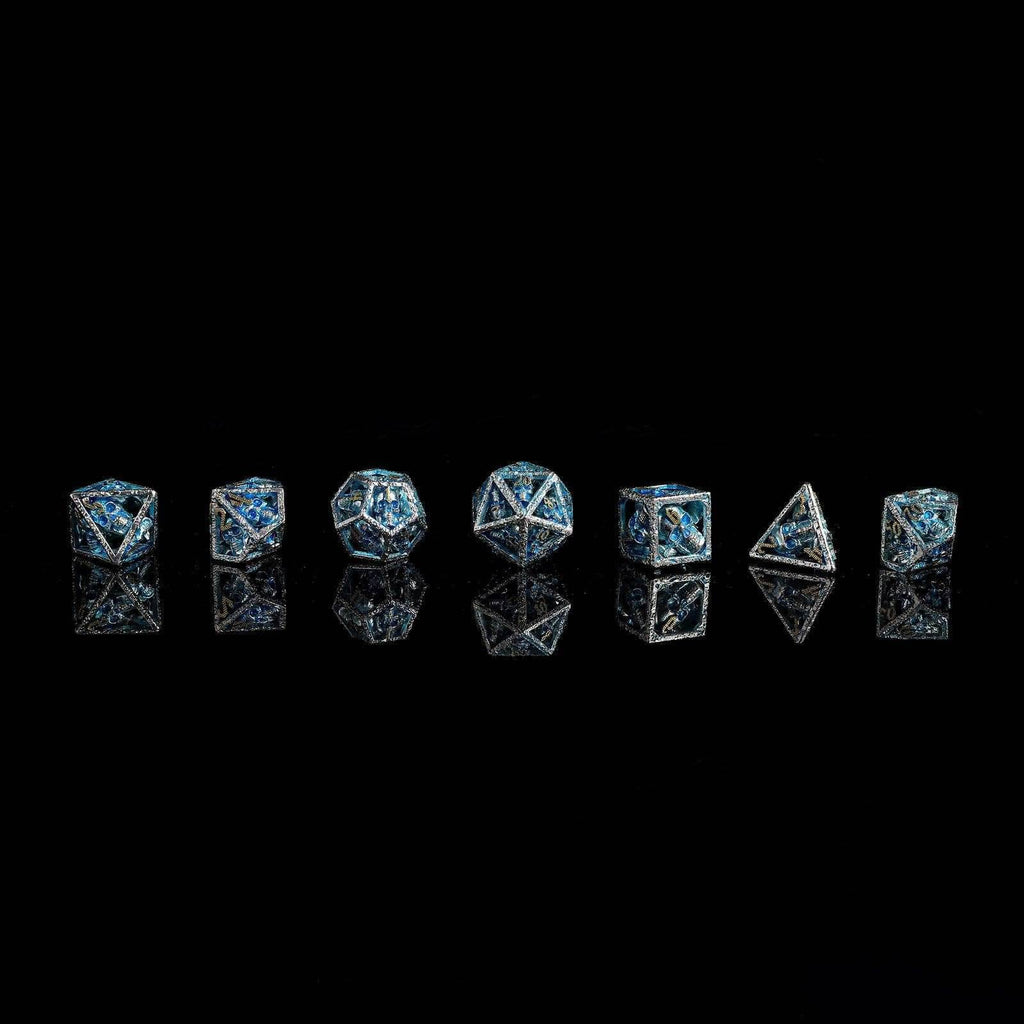 Skull's Grin Hollow Metal Dice Set - Glow in the Dark Blue - 