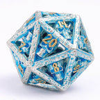 Skull's Grin Hollow Metal Dice Set - Glow in the Dark Blue - 