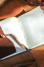 Genuine Leather Journal with Antiqued Handmade Pages, Leather Strap Closure, and Wooden Pencil