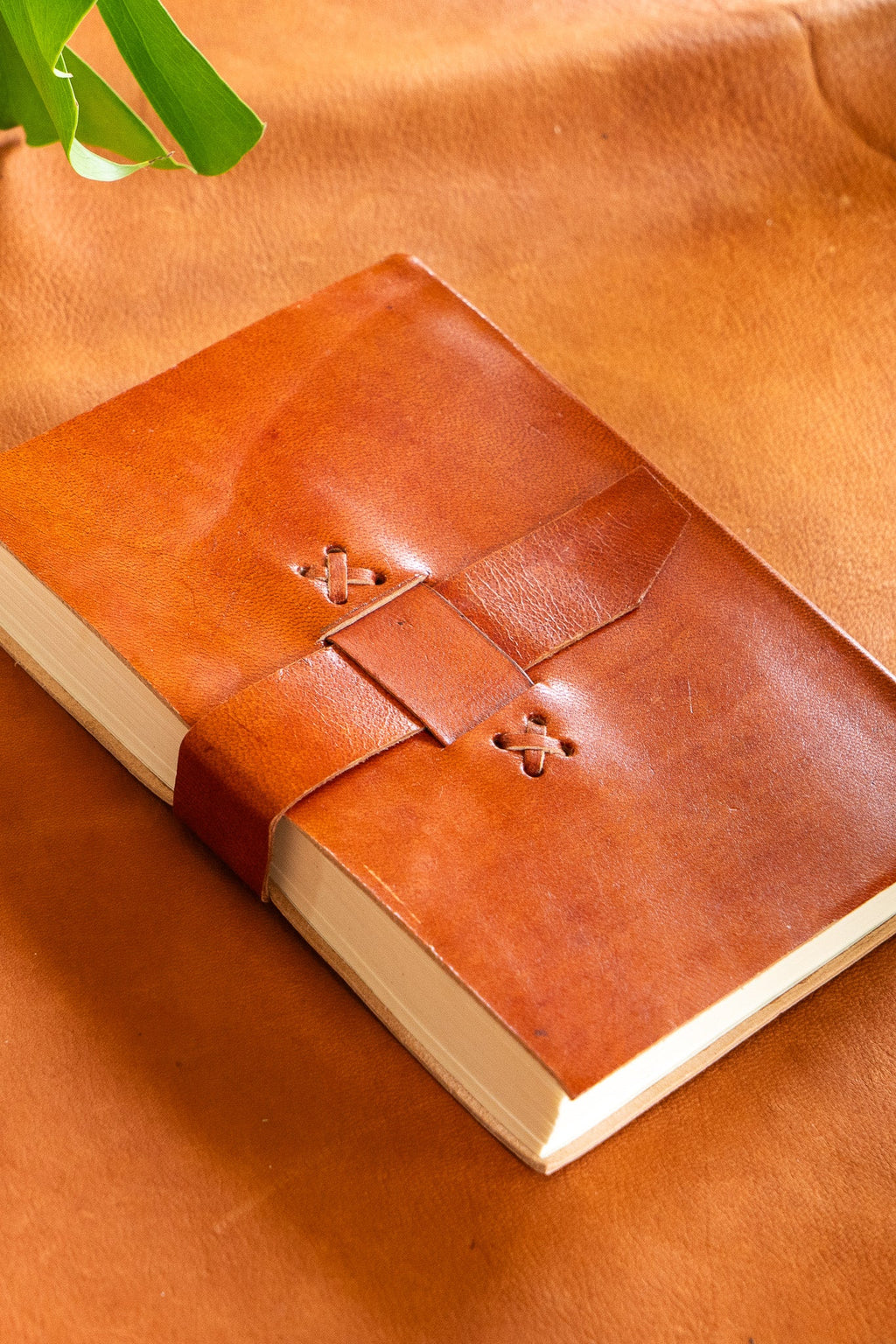The Artisan's Leather Journal with a Stitch Strap Closure
