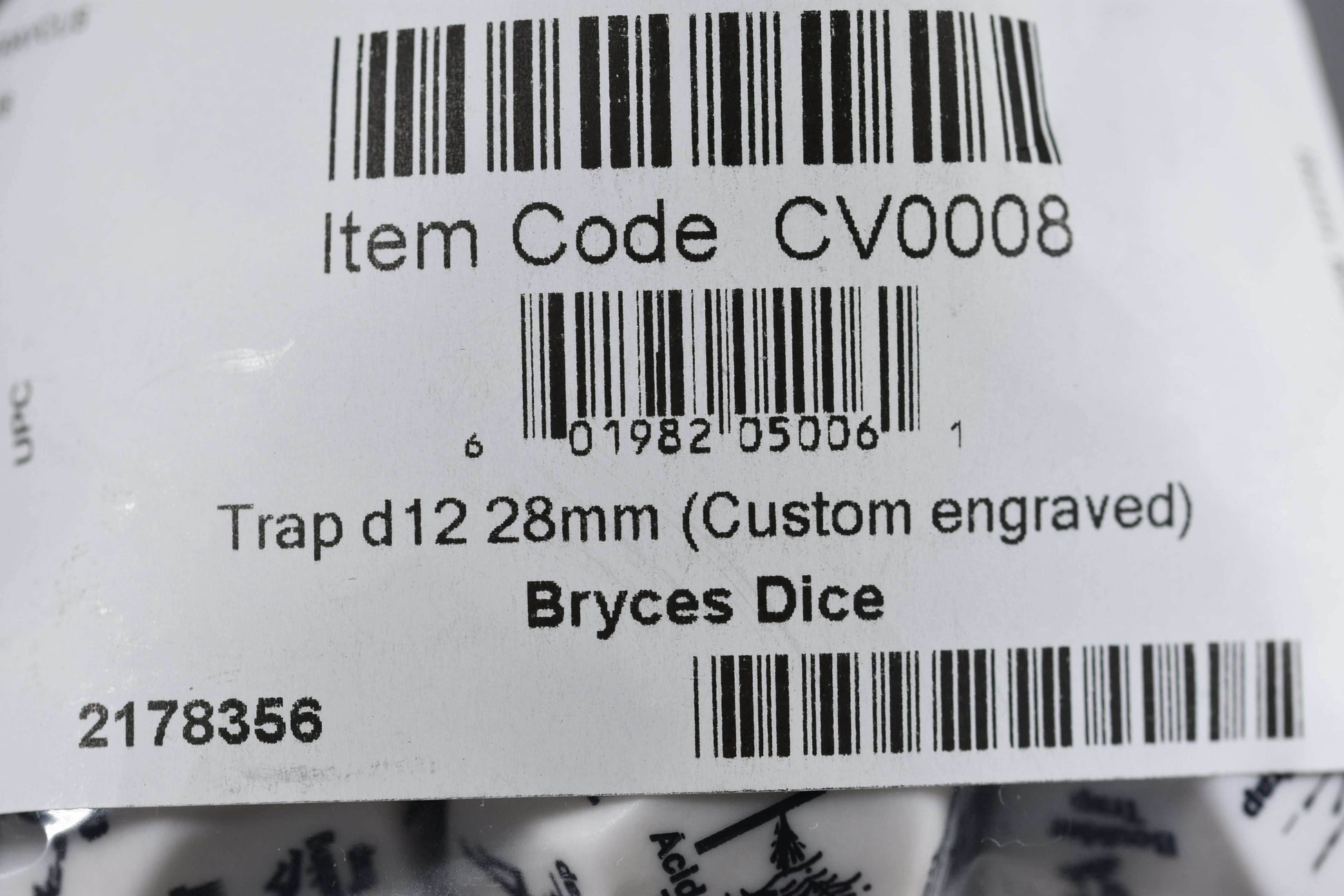 Chessex Opaque White Trap d12 - 28mm Adventure Dice with 12 Unique Traps - 