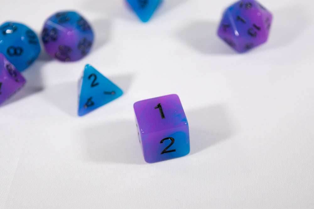 Blue and Purple Glow-in-the-Dark 7-Die Set w/Black Numbers by HDdice - 