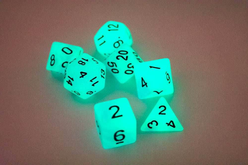 Blue and Purple Glow-in-the-Dark 7-Die Set w/Black Numbers by HDdice - 