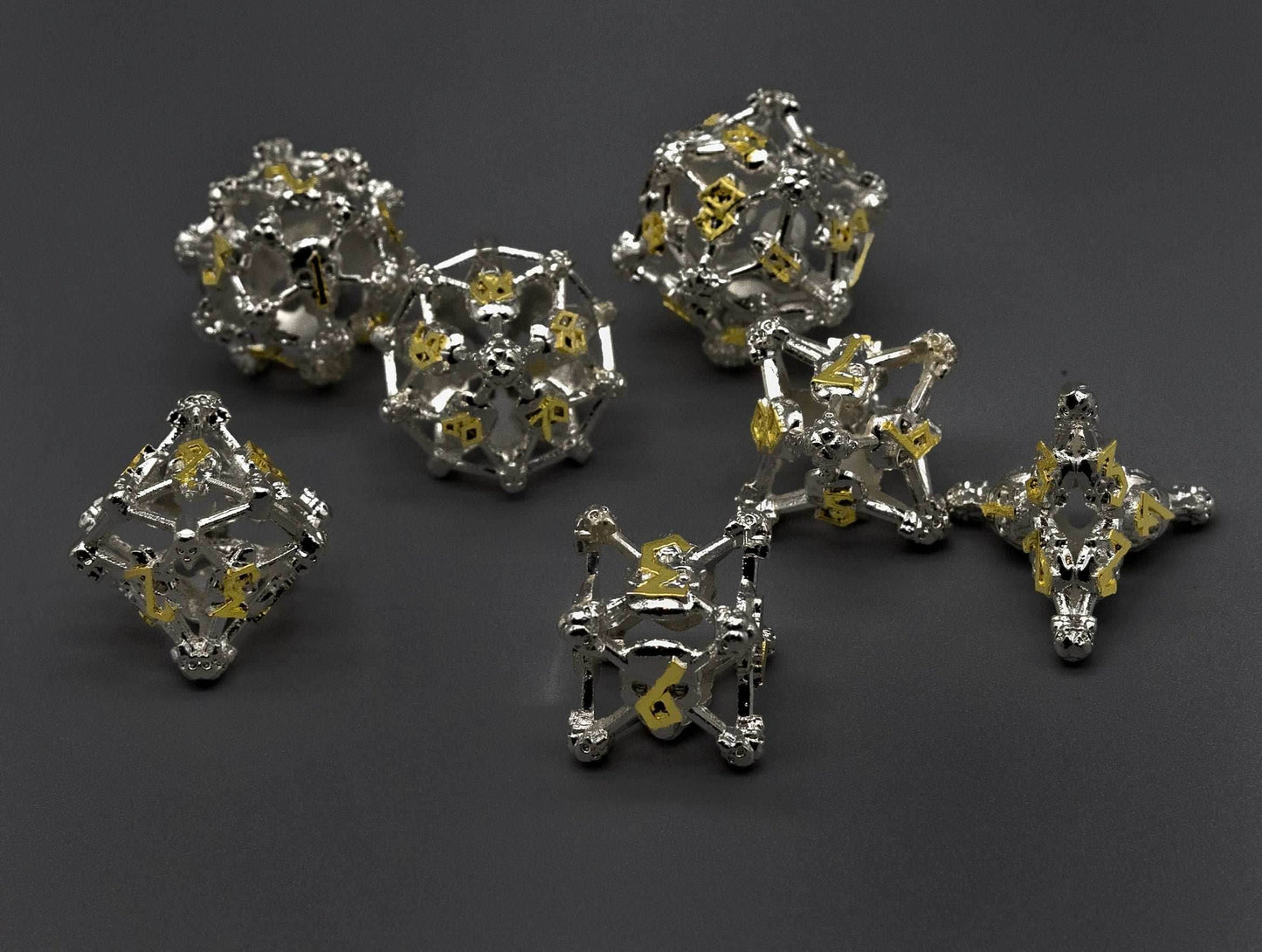White w/Gold Deadly Skull Dice Hollow Metal 7-Dice Set - 7-Dice Set