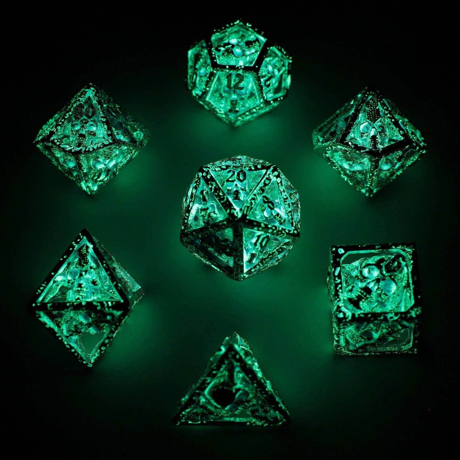 Skull's Grin Hollow Metal Dice Set - Glow in the Dark Blue - 