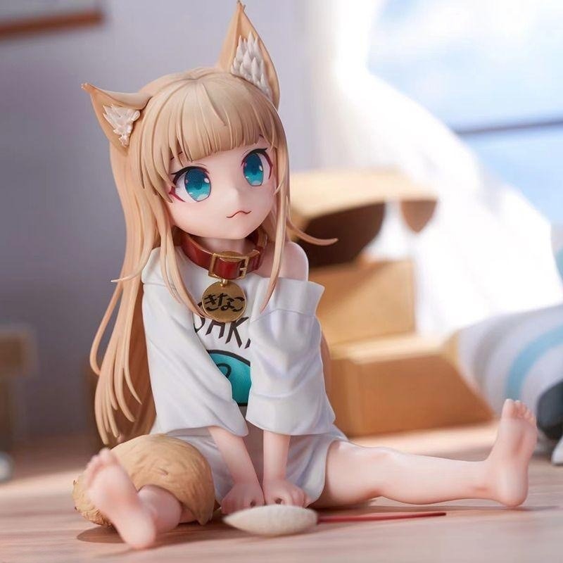 Cat girl sitting and eating fish figure