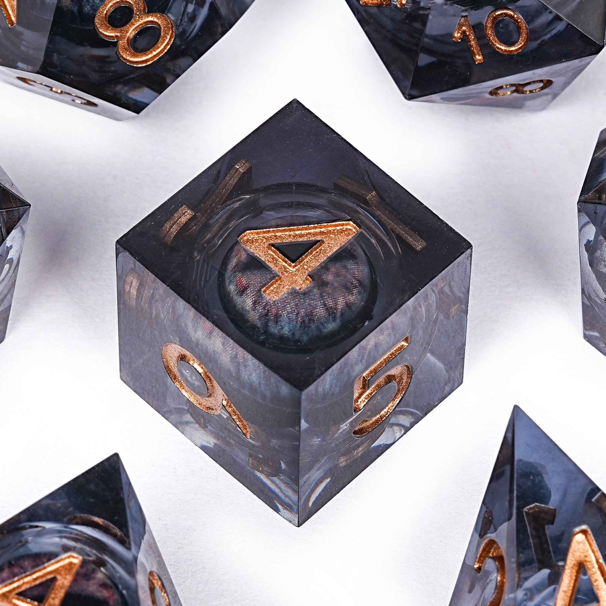 Sharp-edged black dragon's eye transparent liquid core resin DND dice set + copper font