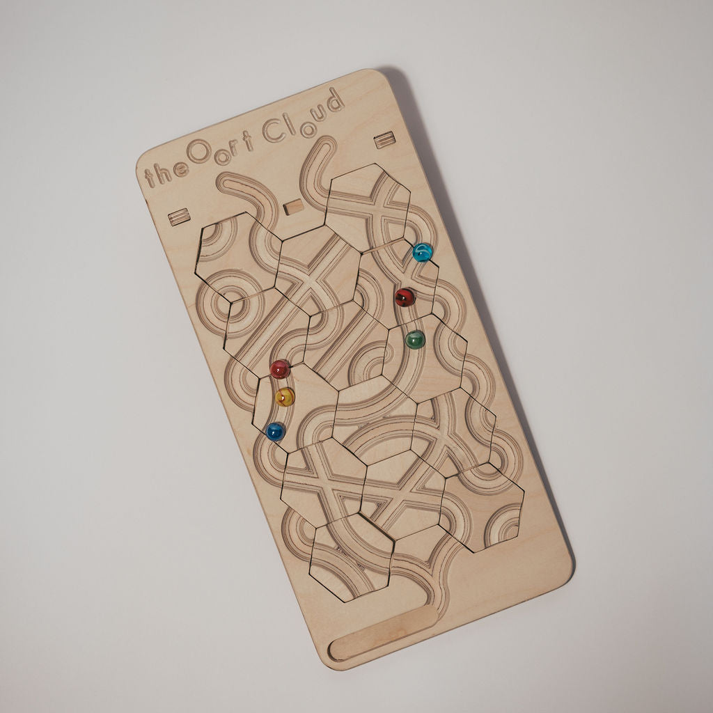 The Oort Cloud: A Marble Run Puzzle Game