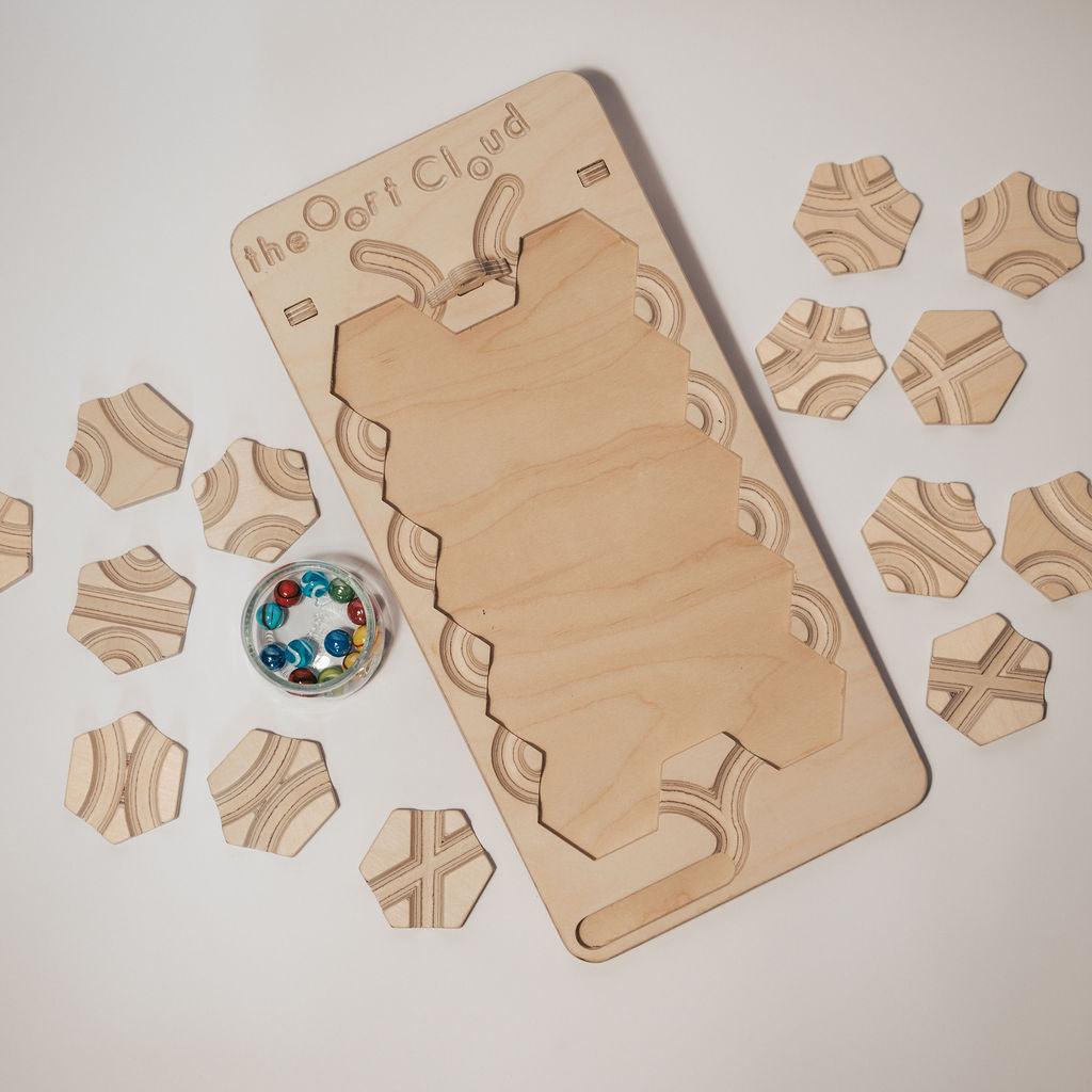 The Oort Cloud: A Marble Run Puzzle Game