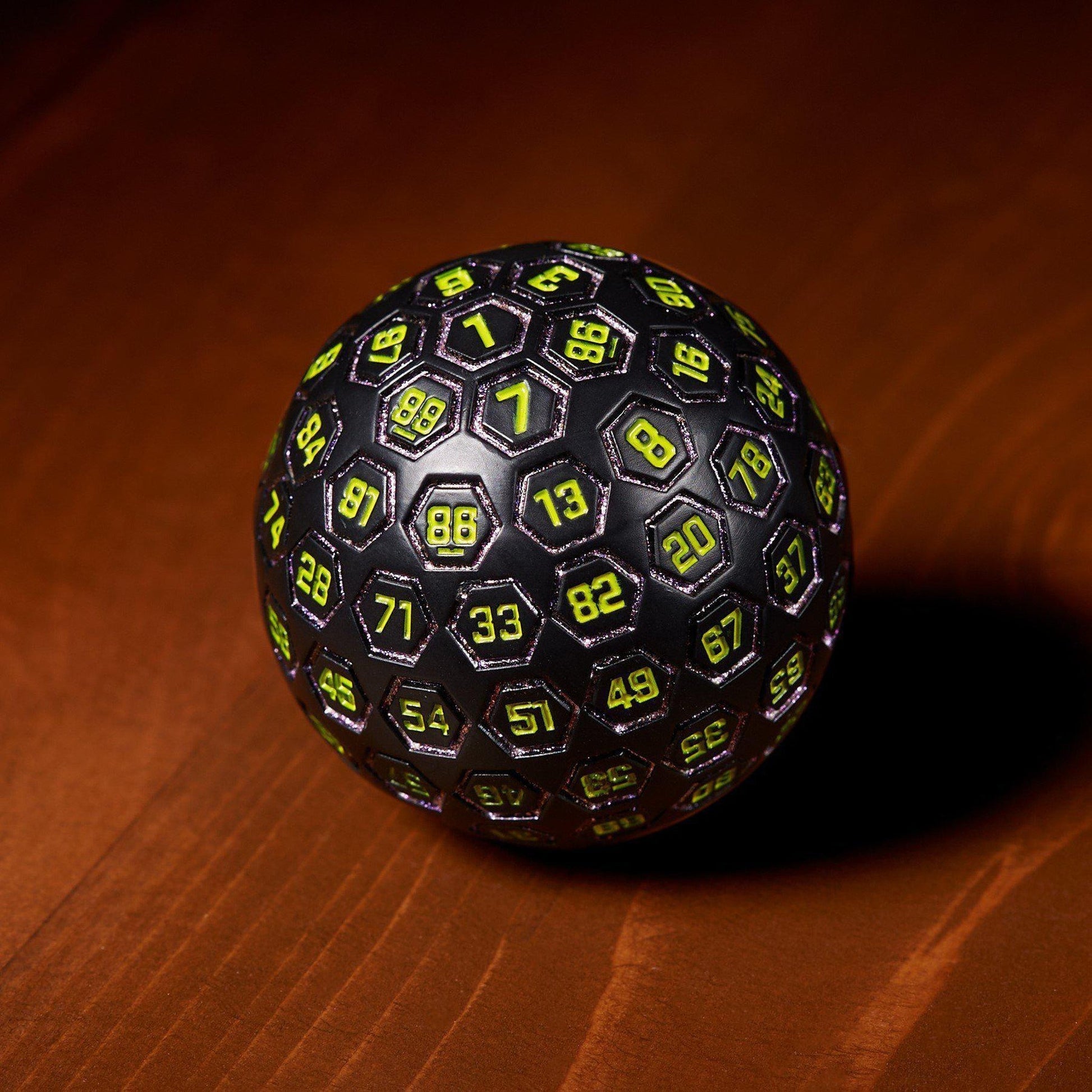 The Orb D100 -  Purple, Neon Green, and Black Metal Die